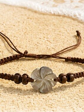 Caligirl Women’s Brown Cord Bracelet with Carved Mother-of-Pearl Flower, nwt